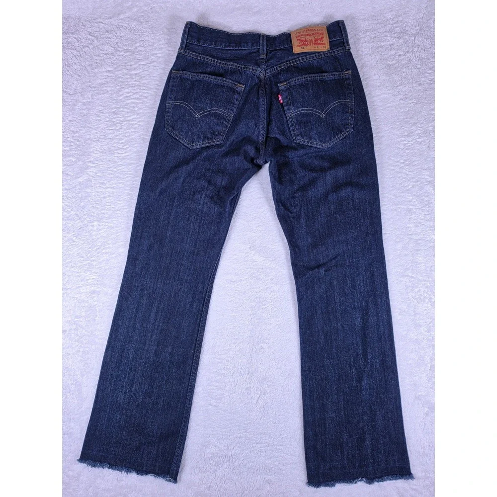 Levi's 527 Slim Bootcut Mens 31/32 Dark Blue Denim Raw Hem Jeans S110760